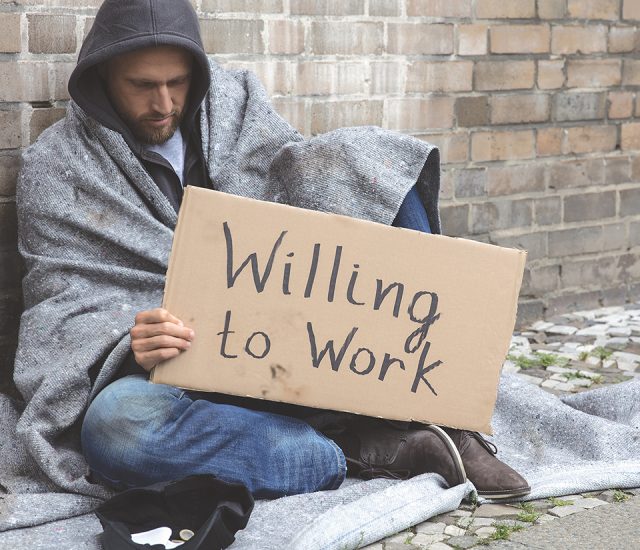 Homeless Man Holding Cardboard With Text Willing To Work